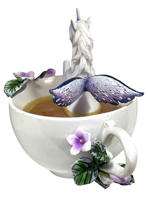 My Store white ceramic tea cup figurine with a white unicorn emerging, adorned with purple flowers and green leaves.