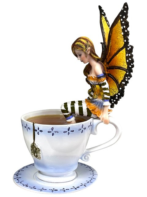My Store Warm Toes Faery figurine by Amy Brown Art, sitting on a teacup with monarch butterfly wings.