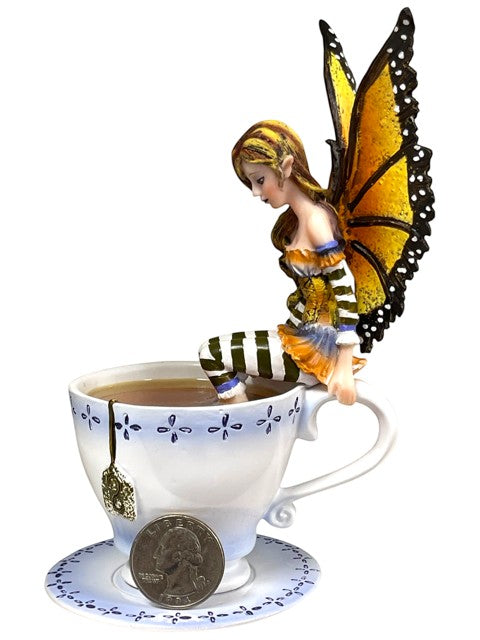 My Store Warm Toes Faery figurine by Amy Brown Art, sitting on a teacup with monarch butterfly wings.