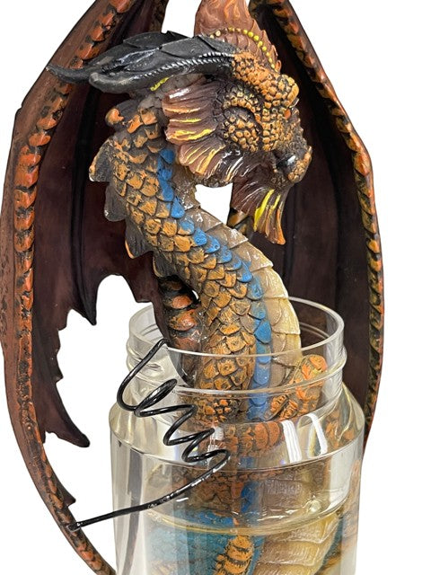 My Store winged dragon figurine in a jar, detailed resin sculpture with orange, brown, and blue scales.