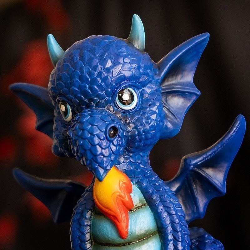 My Store blue dragon figurine with wings, horns, and flame detail. Whimsical fantasy decor.