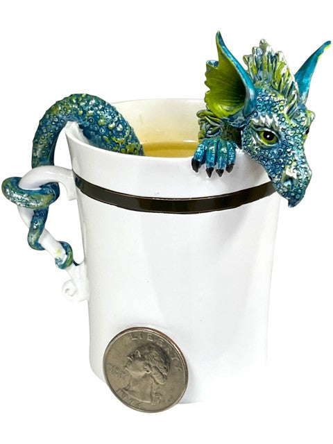 My Store white ceramic mug with a teal and green dragon sculpture coiled around the handle and peeking over the rim.