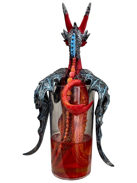 My Store Drinks and Dragons Long Island Iced Tea dragon figurine in a glass with red liquid.
