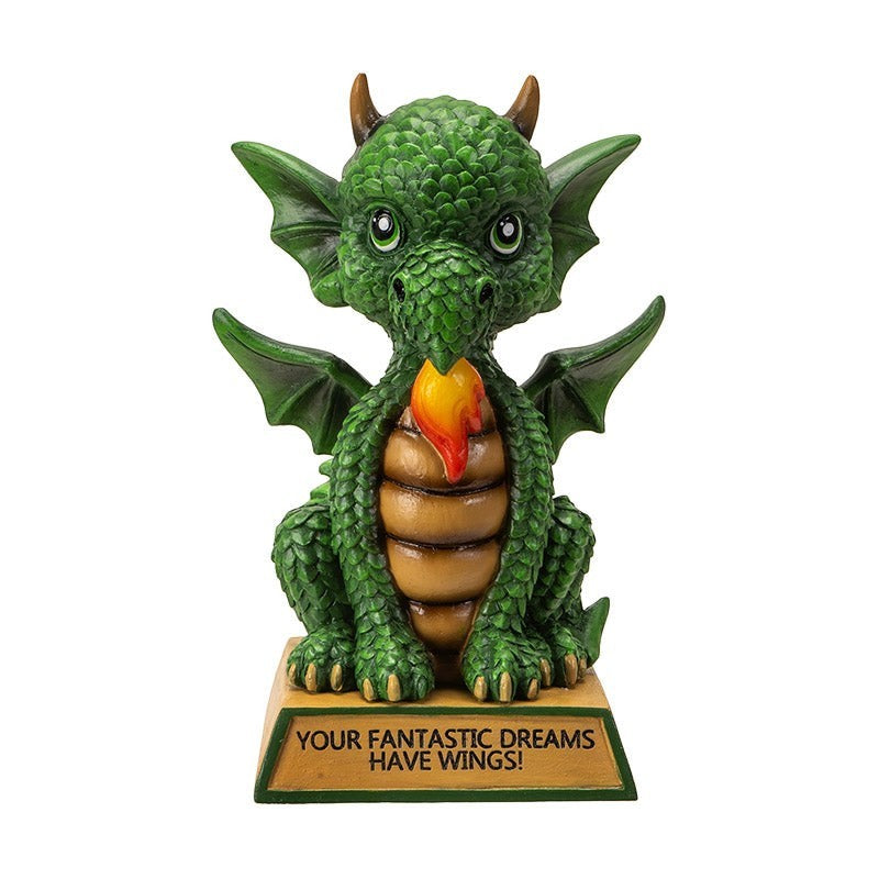 My Store green dragon figurine with wings and flame, inscribed with "Your Fantastic Dreams Have Wings!"