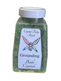 My Store Grounding Bath Crystals in a clear jar with a white lid. Green crystals for grounding and balancing energy.