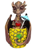 My Store Mai Tai Dragon figurine holding a red apple and a blue umbrella, seated in a pineapple cup.