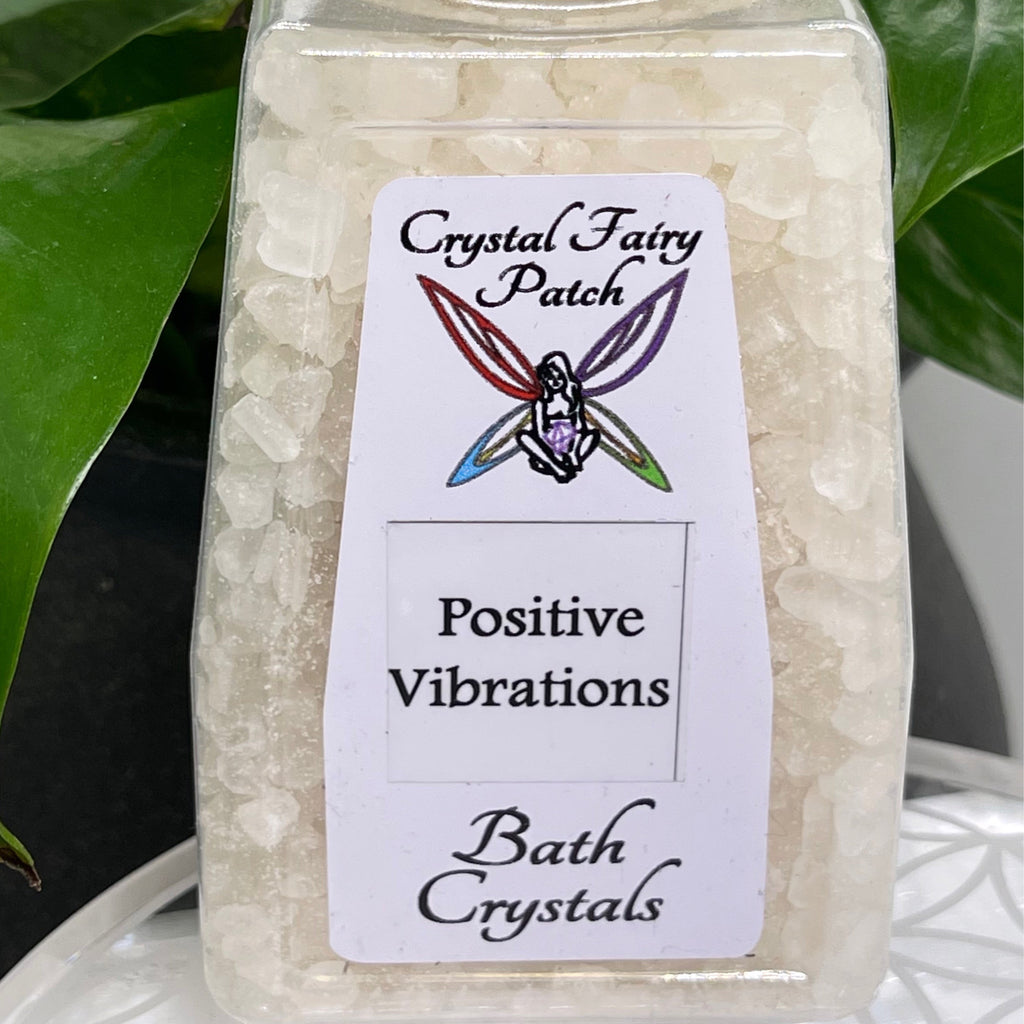 My Store Crystal Fairy Patch Positive Vibrations bath salts in a clear jar with a fairy logo and text. For peace, love, and joy.