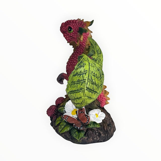 My Store Raspberry Dragon figurine with green leaf wings, red textured body, and butterflies on a base with raspberries and white flowers.