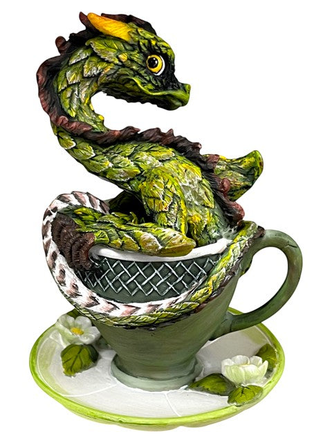 My Store green tea dragon figurine with yellow eyes, coiled in a teacup with floral accents.
