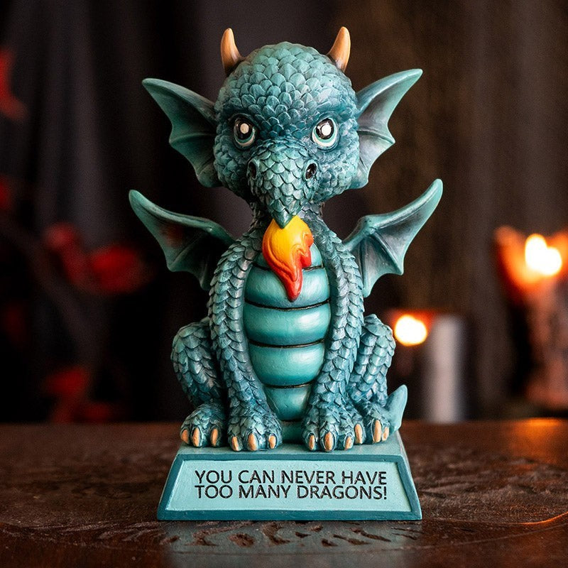 My Store teal blue dragon figurine with intricate scales, wings, and flame detail. Inscribed base reads "You Can Never Have Too Many Dragons".