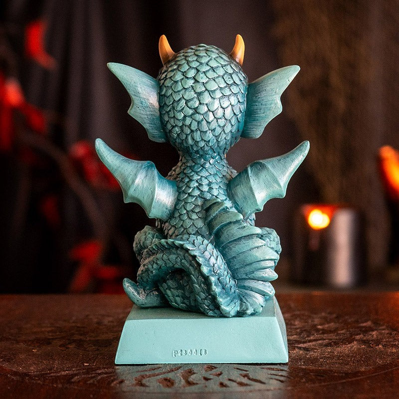 My Store teal blue dragon figurine with intricate scales, wings, and gold horns. Resin, 3.86" X 3.35" X 5.79".