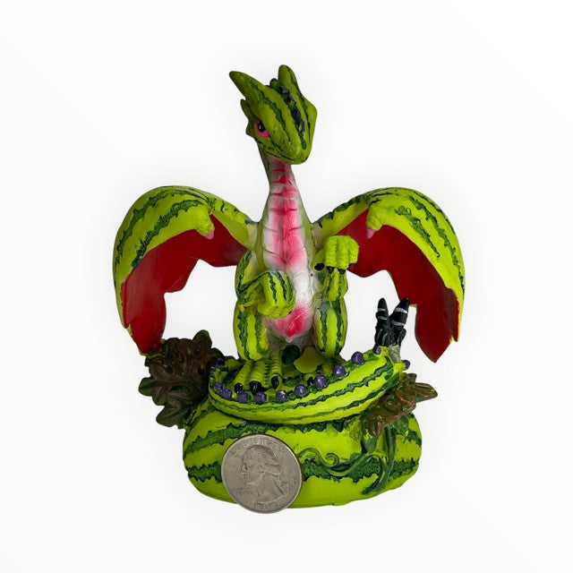 My Store Green Thumb Garden Fruits Series "Watermelon Dragon" figurine by Stanley Morrison. Bright green dragon with watermelon rind pattern, red wings, and pink belly.