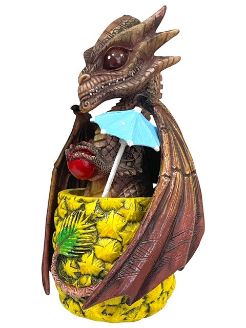 My Store Here Drinks and Dragons Mai Tai Dragon figurine by Stanley Morrison, a brown dragon holding a cherry and a blue umbrella, emerging from a pineapple cup.