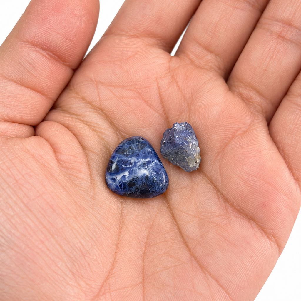 Tanzanite and Sodalite in an open palm for size